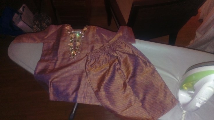 iron-baby-baju-iron-baju-baby :) her first baju kurung raya
