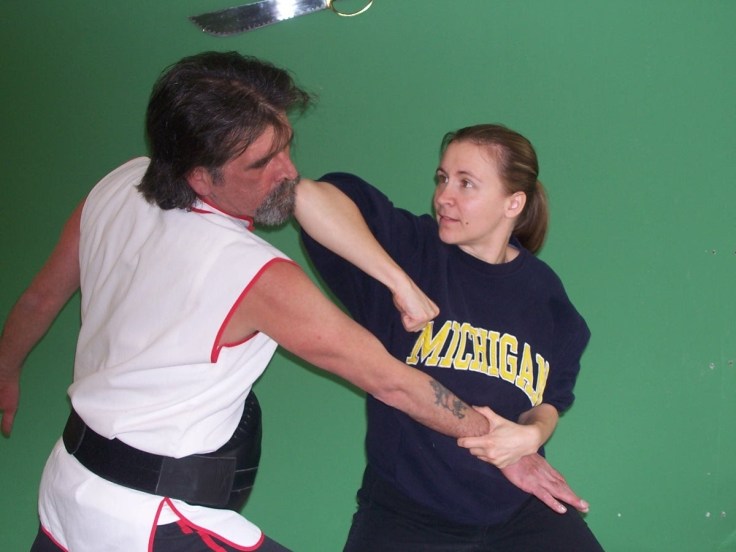"Elbows strikes are delivered from various angles to all parts of an opponent vital to head, body, arms and legs." Quote and Photo source : www.mplsplumblossom.net